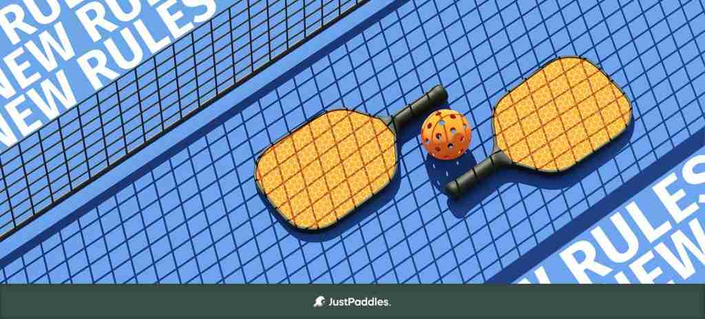 Two pickleball paddles and an orange pickleball on a blue court with the words 'NEW RULES' in bold, representing the 2025 pickleball rule changes.
