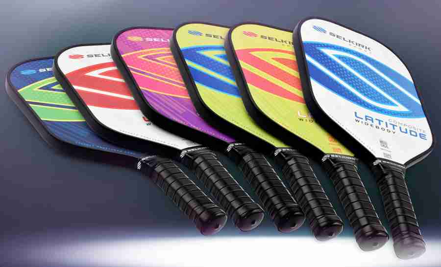 A colourful lineup of Selkirk pickleball paddles in various designs and colors, showcasing the popular Latitude widebody models available to UK players.